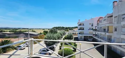 a view of a street from a balcony of a building at Falesia Beach Apartment in Albufeira