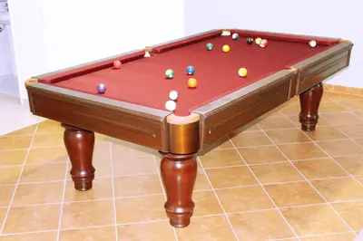 a pool table with balls on top of it at Wonderful Villa in Albufeira