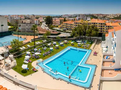 an overhead view of a swimming pool in a resort at Tropical Sol in Albufeira