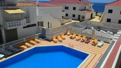 an aerial view of a villa with a swimming pool at Apartamento Oura T1 Beach 200m in Albufeira