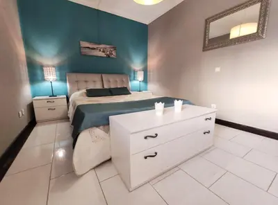 a bedroom with a bed and a white dresser at Apartamento Oura T1 Beach 200m in Albufeira