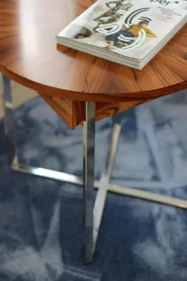 a book sitting on top of a wooden table at L&F House in Algoz