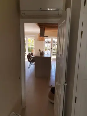 a view of a kitchen from the hallway of a house at T2 Apartment Old Village Vilamoura in Vilamoura