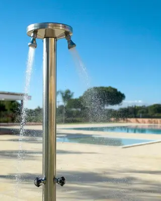 a fountain with water coming out of a pole at Monte Laguna - Clever Details in Vilamoura
