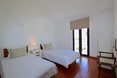 a bedroom with two beds and a window at Marina Parque - Clever Details in Vilamoura