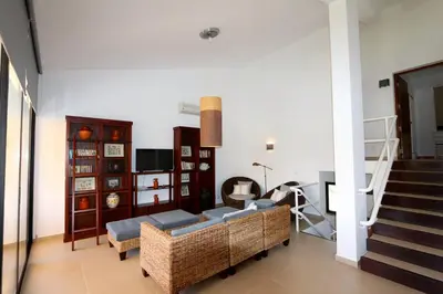 a living room with a couch and a table at Marina Parque - Clever Details in Vilamoura