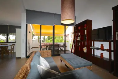a living room with a couch and a tv at Marina Parque - Clever Details in Vilamoura