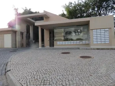 a house with a brick driveway in front of it at Apartamento em Quinta da Barracuda in Albufeira