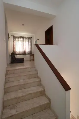 a stairway in a home with a stair case at Villa Gonçalves in Albufeira