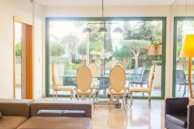 a dining room with a table and chairs at Marina Vilamoura - Aquamar 013 - By VilamouraSun in Vilamoura