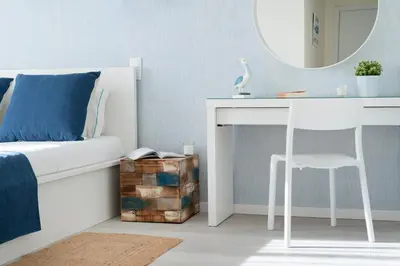 a bedroom with a bed with a desk and a mirror at Vila dos Lírios - Blue Sea in Albufeira