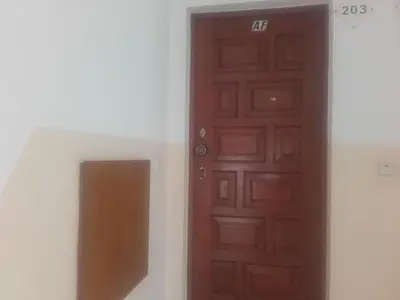 a brown door with the number next to it at Albufeira INN - Elimar 3 T1 in Albufeira