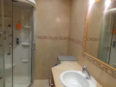 a bathroom with a shower toilet and a sink at Albufeira INN - Elimar 5 T1 in Albufeira