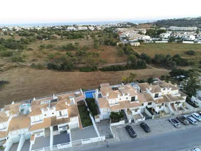 an aerial view of a group of white houses at Villa Coelho - By Algarkasa in Albufeira