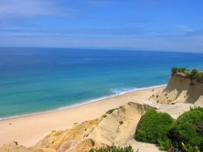 an aerial view of a beach with the ocean at Villas King's in Albufeira