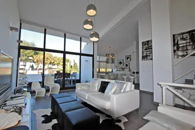 a kitchen and dining room with a white table and chairs at Marina Parque 83 - Clever Details in Vilamoura