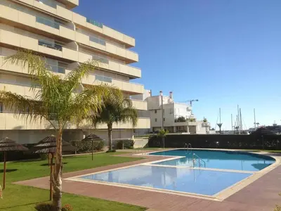 a bathroom with a sink and a glass shower at Marina Vilamoura - Aquamar 403 by Vilamoura Sun in Vilamoura