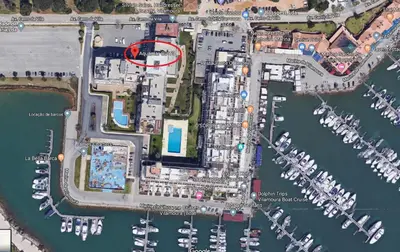 a map of a marina with a red circle at Marina Vilamoura - Aquamar 403 by Vilamoura Sun in Vilamoura