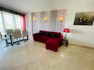a kitchen with a counter top with a mirror at Marina Vilamoura - Aquamar 403 by Vilamoura Sun in Vilamoura