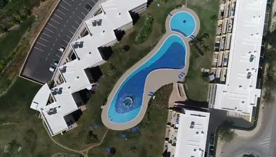an aerial view of a swimming pool in a building at Algarve 