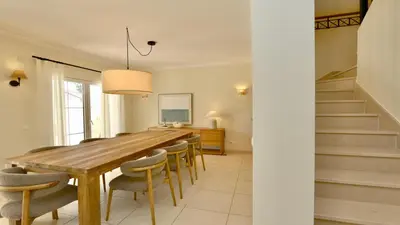 a hotel room with a bed and a bathroom at Villa Amendoeira 4 - Clever Details in Vilamoura
