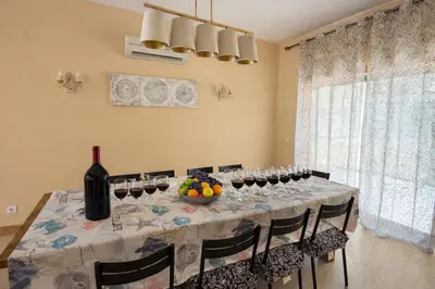 a villa with a swimming pool at night at Villa Corcovada Vitória with private pool in Albufeira