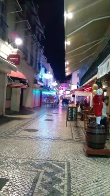 an empty street in a city at night at Peneco II in Albufeira