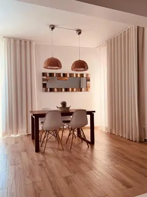 a dining room with a table and chairs at Beautiful Apartment In Albufeira Marina in Albufeira