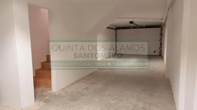 a room with a sign that reads guillaume dos almas santos at Moradia Townhouse Vila Rosal 2 in Albufeira