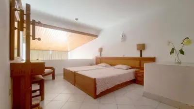 a bedroom with a bed in a white room at Albufeira, Cerro Branco (41) in Albufeira
