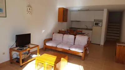 a living room with a couch and a table at Albufeira, Cerro Branco (42) in Albufeira