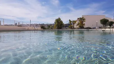 a large pool of water in front of a building at Albufeira, Ocean terrace (22) in Albufeira
