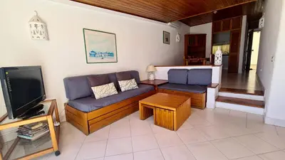 a living room with a couch and a tv at Albufeira, Sea Balcony (11) in Albufeira