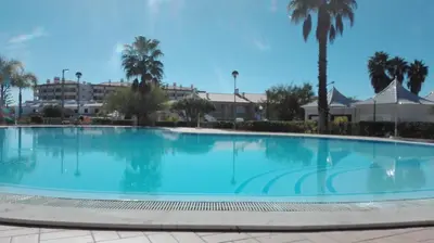 an apartment building with balconies and flowers at Appartement Villamoura in Vilamoura