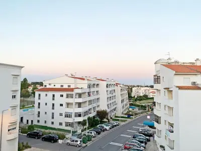 arial view of a street in a city with buildings at Ouranascente in Albufeira