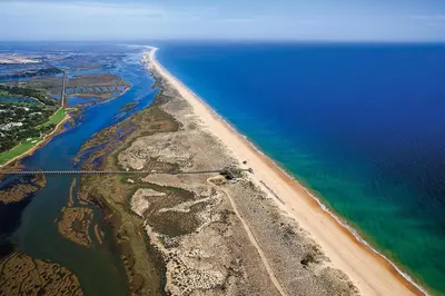 an aerial view of a beach and the ocean at THE LAKERS Boutique Apartment in Quinta do Lago
