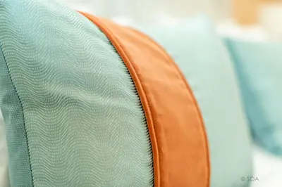 a close up of the back of a leather couch at Casa Beny 1897 Guesthouse in Loulé