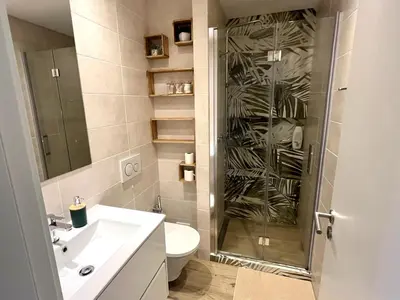 a bathroom with a shower and a toilet and a sink at ExcelStay - Balaia in Albufeira
