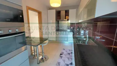 a kitchen with a counter and a glass counter top at Apartamento Vitismar CA in Guia