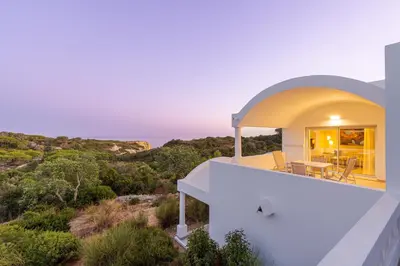 a house with a view of the ocean at Hapimag Resort Albufeira in Albufeira
