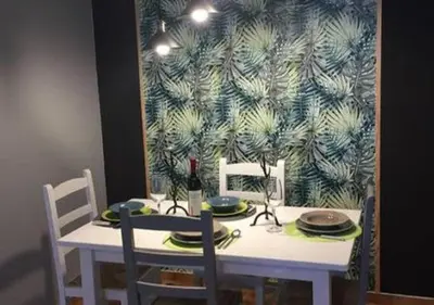 a table with two chairs and a white table with at Fisherman´s beach apartment in Albufeira