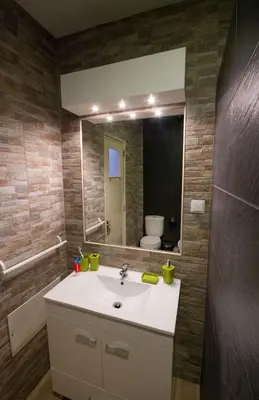 a bathroom with a sink and a mirror at Old Town Sant'ana T2 in Albufeira