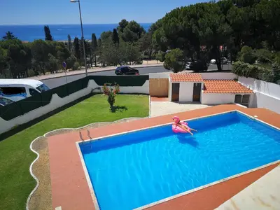 a swimming pool with a toy in a yard at Vista Mar 2 in Albufeira