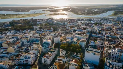 an aerial view of a city with blue buildings at Hostel Casa d'Alagoa in Faro