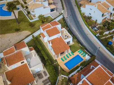 an aerial view of a house with a swimming pool at Villa 300m from Beach - By Algarkasa in Albufeira