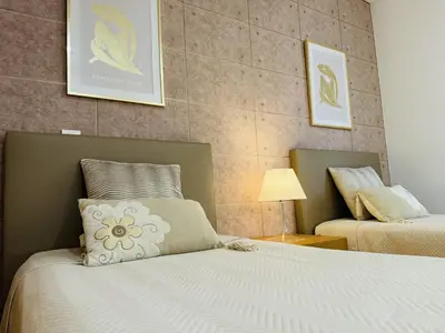 a bedroom with a bed with a pillow on it at Marina Vilamoura - Aquamar 320 by Vilamoura Sun in Vilamoura