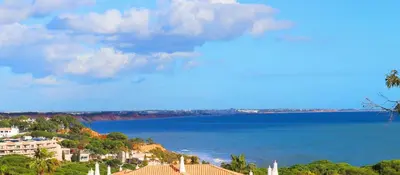 a view of the ocean from a city with buildings at Santa Eulalia Mar in Albufeira