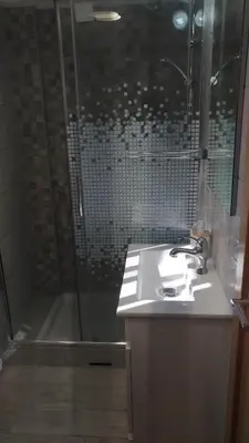a bathroom with a sink and a shower at Apt Cardoso 3 ao lado da Praia Peneco in Albufeira