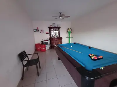 a living room with a pool table in it at Villa Ramos in Albufeira