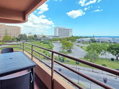 a balcony with a view of a street at Dom Pedro Portobelo in Vilamoura